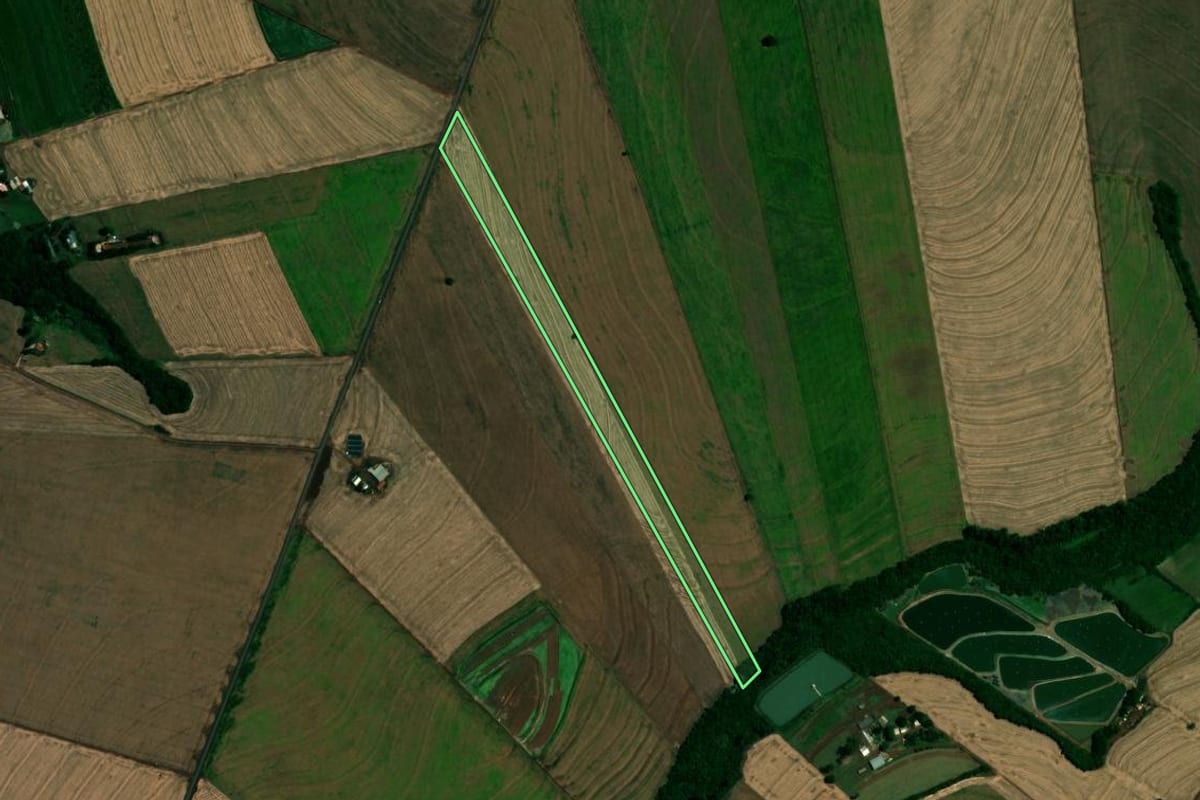 Imagem de satélite do imóvel rural em Tupãssi (PR), com o contorno declarado no CAR desenhado por cima.