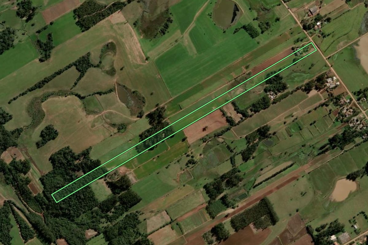 Imagem de satélite do imóvel rural em Agudo (RS), com o contorno declarado no CAR desenhado por cima.
